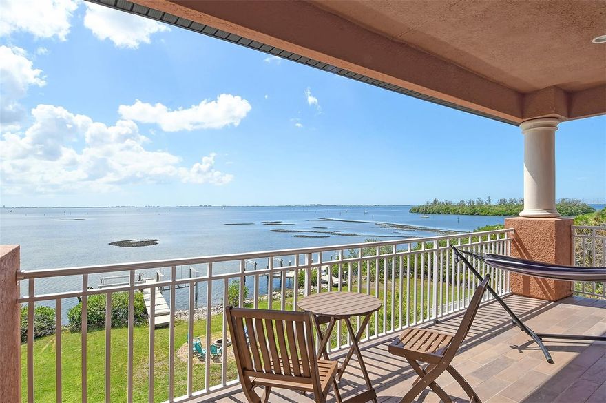 Spectacular Waterfront Property along the shores of Sarasota Bay. This home offers 6,204 sq. ft. of air-conditioned luxury and breathtaking Sarasota Bay views in an intimate and private setting. With panoramic bay views, this family-friendly residence is ideal for entertaining or simply relaxing in style. A chef’s kitchen with a Wolf gas range, Wolf double oven, Sub-zero refrigerator, warming drawer, microwave, small sink and faucet on large center island, mounted pot filler. The main living floor has unobstructed, breathtaking views of Sarasota Bay with a formal dining area, small kitchenette with wine chiller, multiple tv/living rooms, wine cellar. Upstairs the master suite includes a fireplace, private balcony, and an en-suite bath with a garden tub, Roman shower, dual sinks, bidet, and two walk-in closets. One en-suite bedroom as well as two bedrooms with a shared bathroom. The home includes a 4 car garage, Tesla EV charger. An elevator from ground floor to top third floor. The expansive outdoor space includes a private pool, spa, fire pit, private dock with boat lift (12k pound capacity) and jet ski lift (9k pound capacity) all set against the serene backdrop of Sarasota Bay. 2500 sq. ft. poured concrete pad with gas hookup for an outdoor kitchen.  Roof mounted solar panels (average FPL bill is $160). An electric front gate that adds privacy and security. 15 minutes to Downtown Sarasota, 8 minutes to IMG, 18 minutes to Bradenton/Coquina Beach, and close to Lido, Siesta, and Anna Maria Islands. This extraordinary waterfront home is an unparalleled sanctuary, offering both luxury living and prime access to the best of Sarasota and Bradenton.