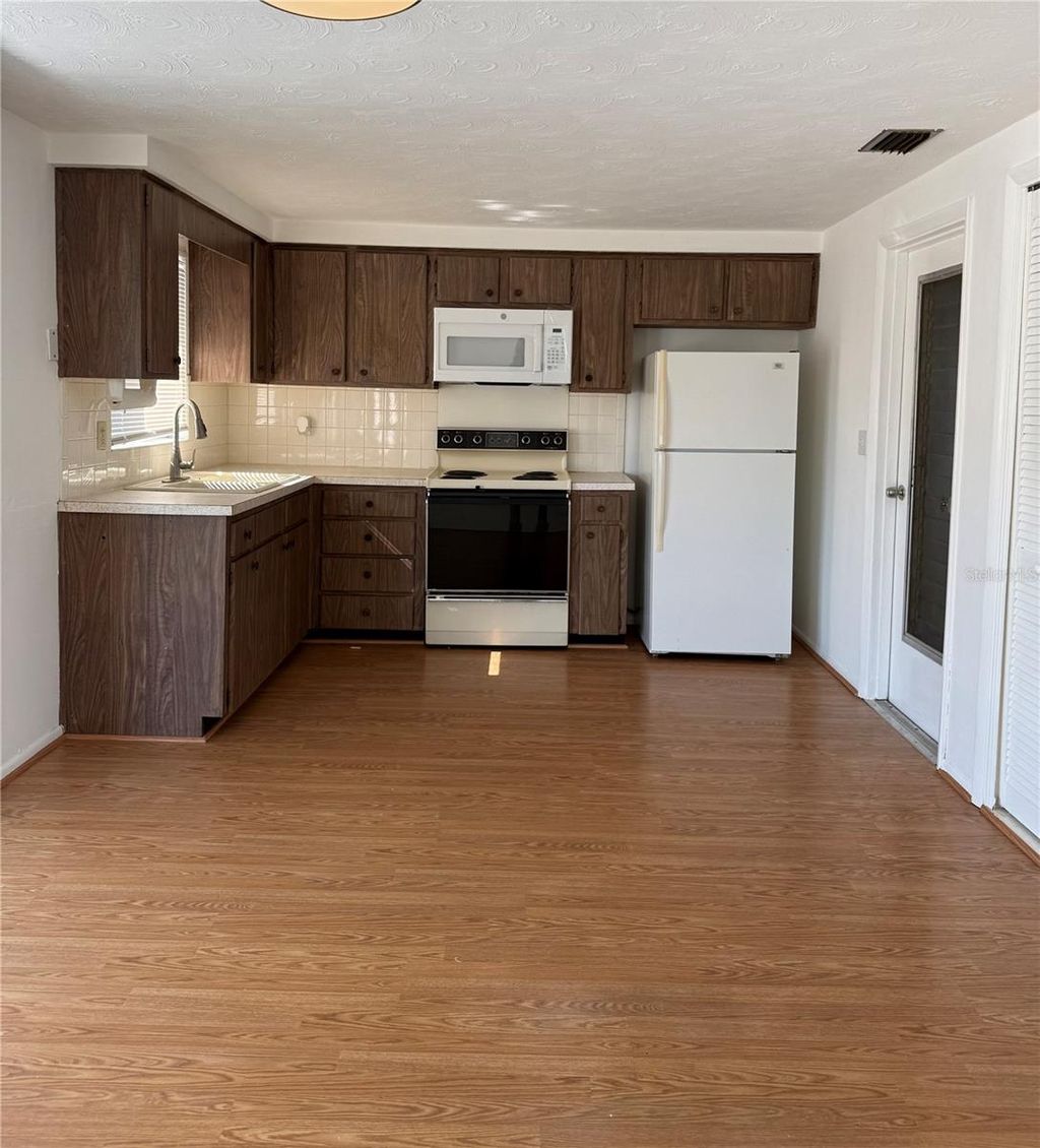 Photo of 3838 Beechwood Drive, Holiday, FL 34691 (MLS # TB8470084)