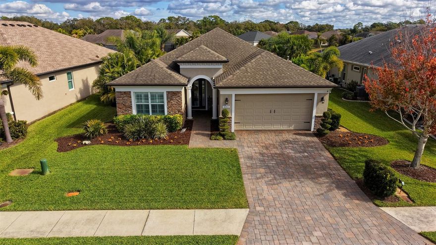 Enjoy the ultimate Florida lifestyle and captivating resort style living.  Located in this well sought-after community of Greyhawk Landing with 24- hour gated security. This impeccably kept Allura model, built in 2017 by Homes by Towne, boasts many quality upgrades and offers 3 bedrooms, 2 bathrooms, 1,827 square feet with a 2-car garage on a premium lot with a pond view on a cul-de-sac.  Beginning with the lush and mature landscaping, you are led into the impressive entrance which features veneer stone on the front of the home with a paver driveway & walkway. As you enter this pristine and tastefully appointed home, your first view is of the open-floor plan overlooking the gorgeous, covered lanai featuring brick pavers and exceptionally comforting views of the electric heated pool and a spectacular pond view.  Features are an open floor plan, high ceilings, gas water heater, low HOA Fees of $70.00/year, prewired for security system, Rough-in for outdoor summer kitchen for gas or electric, newer electric pool heater 2019, new LVP Flooring and baseboards throughout the entire home, tray ceiling in the great room and the foyer, kitchen features upgraded kitchen cabinets with 42” uppers, Moen plumbing fixtures throughout, above and below cabinet lighting with light valance in the kitchen, upgraded 3cm granite counters in the kitchen, tile backsplash and large center island with a walk-in pantry, stainless steel appliances, newer microwave 2023, newer dishwasher 2023, gas range, gas dryer, washer, laundry room is roughed-in for a sink, newer plantation shutters on all windows, upgraded Hurricane Impact main entry door, rain gutters have been placed around entire home, in-wall pest tube system, 16 Seer high efficiency heat pump with variable speed air handler, new landscaping in the back of the home, new shiplap in the entryway of the home as well as the primary bathroom, metal hurricane shutters, pull-down ladder in the garage, upgraded dual lighting for the pool and reclaimed water for the irrigation. The owner’s suite is separated from the guest bedrooms; the primary bathroom has dual sinks and a walk-in shower. The guest bedrooms are all generously sized which share a hall-way bathroom with Verona marble counters.
This picturesque community features everything a family is looking for.  Spend time at the heated community lagoon style resort pool, spa, fitness center, tennis, pickle ball courts, lighted basketball court, playground, soccer field, baseball field, fishing pier extensive walking and biking trails.  There is also a second beautiful community pool and spa with a clubhouse for gatherings, fitness classes and water aerobics to partake in. In addition to these fantastic qualities, this home is also convenient for top rated schools, shopping, dining, medical facilities, two international airports, golf courses, boating facilities, and is located near Lakewood Ranch, Sarasota and Tampa.  Take advantage of the gorgeous and pristine Florida beaches, as you have your pick of many!  Enjoy additional family fun at major attractions that are approximately an hour to two hours away including Disney World, Sea World, Busch Gardens and Universal Studios!  
Schedule an appointment now to see what your new home and lifestyle can be! Please also view the attached flyers indicating all the home’s features and finishes.