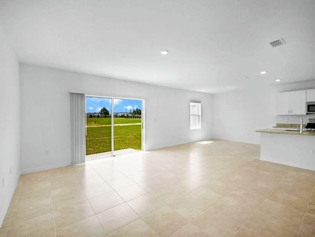 Photo of 5656 Costa Blanca Way, Davenport, FL 33897 (MLS # S5142752)