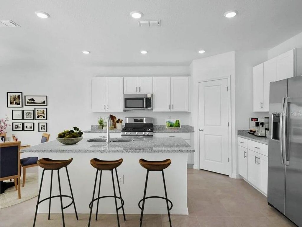 Photo of 5656 Costa Blanca Way, Davenport, FL 33897 (MLS # S5142752)