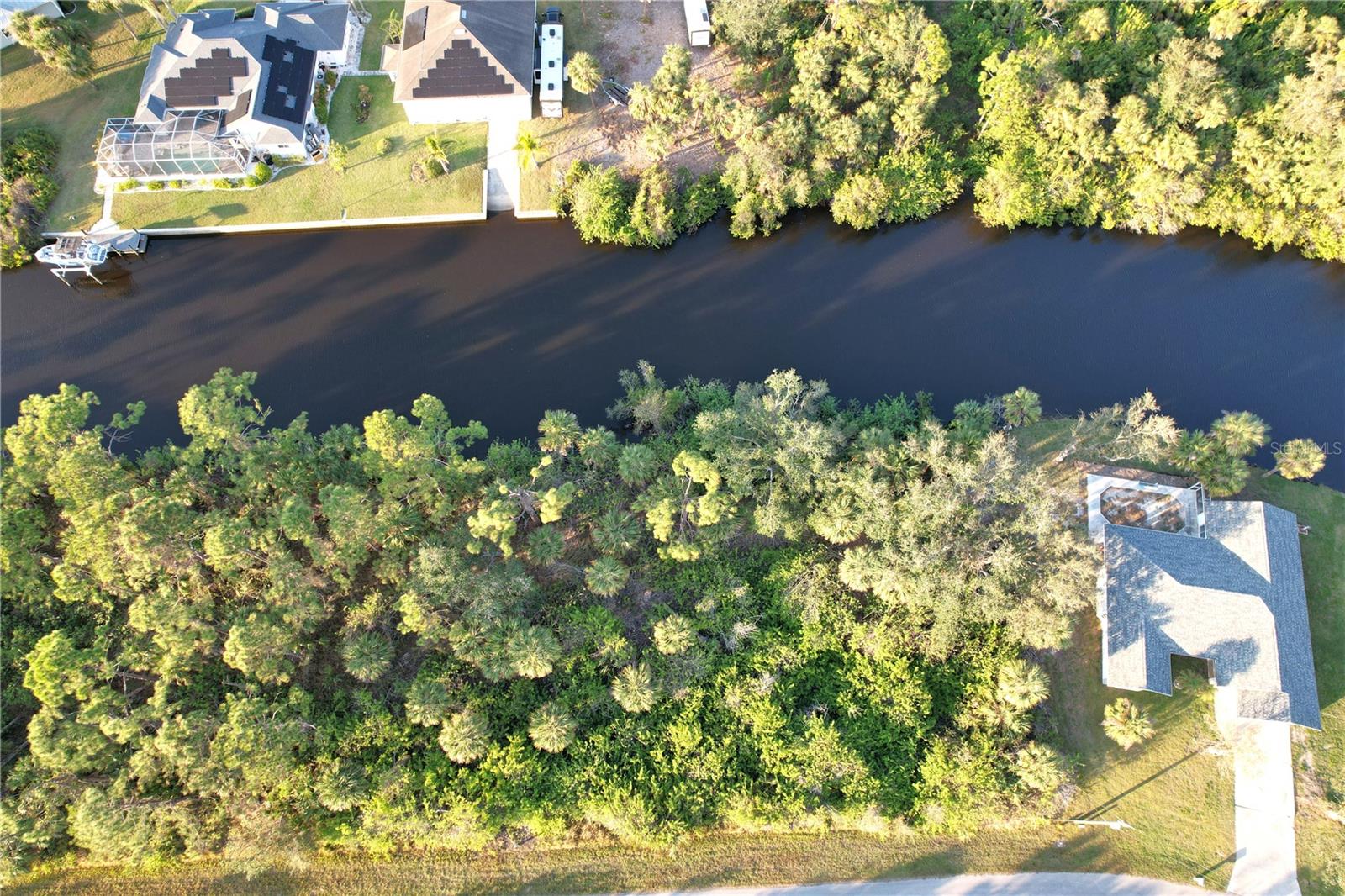Salt Water front Lot. Great opportunity to buy and build or invest and wait. Location is close to Highway 41 or Tamiami Trail and Highway I-75. Lot size: 0.23 of acre = 10,000 sq ft. Great location to invest or build your new home. Pick your own builder or ask for help. Conveniently located close to I-75 and local amenities, beaches, and Tiki Bars and Live entertainment daily. The best Tarpon and red game fishing in the world with off speed boat racing to spring training baseball teams as The Atlanta Braves and Tampa Rays baseball teams. Just want to go to the local beaches (Port Charlotte, Boca Grande, Englewood and Sarasota beaches) or fishing for the day. Great to do it all with whatever you can dream or do as a hobby. Local International Airports: Fort Myers, Sarasota and local Punta Gorda with Allegiant airlines direct. Many outdoor concert venues weekly. Many local Tiki Clubs watch live entertainment to have a Sunset view. Local parks, state parks, tennis or pickleball, to amazing golf courses. You deserve to view this property and make it your home or investment. Scrub jay free. No permit needed.
