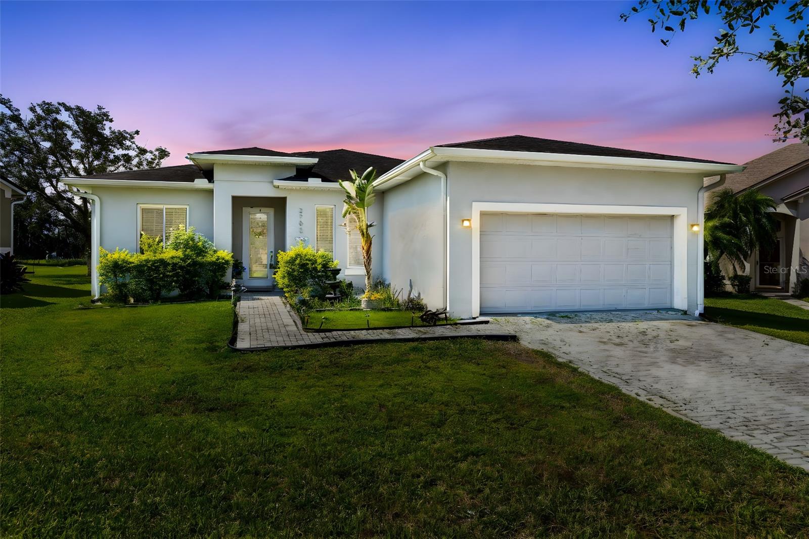 Welcome Home!! Nestled away in one of the most sought after gated communities lies this gorgeous 4 bedroom sits on the most lushes green golf course imagined. As you come up to your Italian stoned paved driveway, you'll see the uniquely contemporary style home. Greeting you will be the glass upgraded door. Enter the home with its beautiful porcelain tile and take in the stunning view of the golf course and water view right from the living room and covered lanai. Upgraded kitchen with latest stainless-steel appliances and solid wood cabinets with every color musicality chosen to give this home a modern fresh look. Fresh Paint and new rug this home seems almost brand new. One of the best investments you could ever make! Golf Community features, Clubhouse, pool, basketball, tennis, parks, lakes, trails, stores, and so much more! You'll feel like resort style living every day! Don't miss your opportunity of a lifetime!
