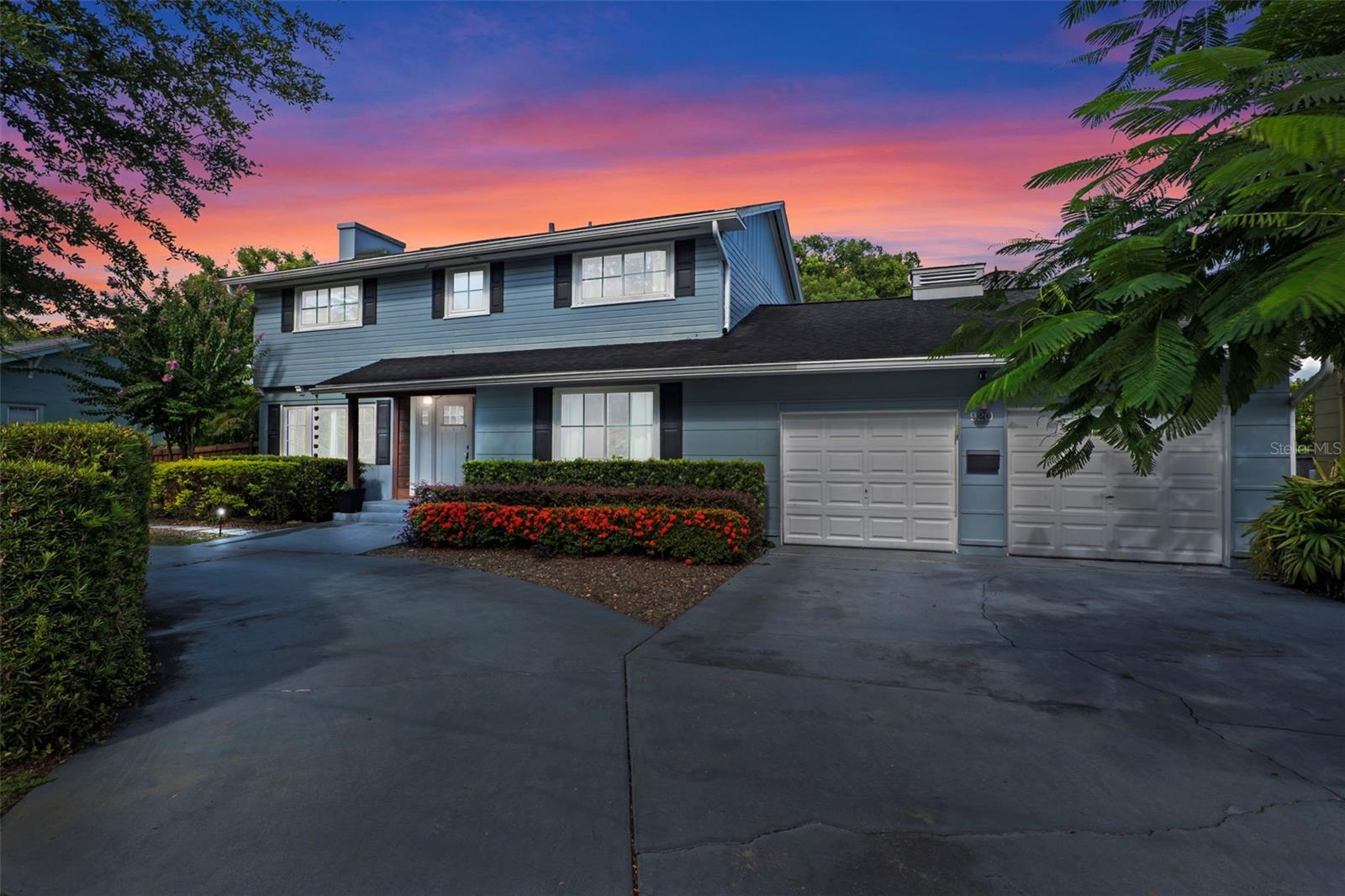 Step into timeless style with this beautifully maintained mid-century modern home sitting on a large 0.29-acre lot in the heart of Delaney Park, one of downtown Orlando’s most sought-after neighborhoods, and just stone’s throw from the 903 Mills Market and right around the corner from Lake Davis, where you can enjoy walking paths and views of the downtown Orlando skyline. Built in the 1950s, this home embraces the clean lines, thoughtful architecture, and organic flow that define the era, while offering modern updates and comforts you'd expect today.
From the moment you pull into the half-circle driveway, the home draws you in with its understated curb appeal. Inside, the open living and dining room area, featuring rich wood floors and exposed beam ceilings, welcomes you with sunlight streaming through the updated windows.
The kitchen blends classic and contemporary with quartz countertops, a farm sink, and custom espresso cabinetry. It is equipped with stainless steel appliances including a Frigidaire double oven and refrigerator, a cooktop, and a dishwasher. Just around the corner, a first-floor bedroom and updated full bath offer flexibility for guests, office, or multigenerational living.
Right off the kitchen, you'll find access to the oversized two-car garage, complete with space for laundry and a built-in mudroom area. Head upstairs and discover the primary suite, nestled quietly in the northeast corner. It features custom built-in closet features and a spa-inspired bathroom with a rain shower and beautifully selected modern finishes, including Designer-grade Oceana Azul Tile. Down the hall, where the wall displays the original blueprints of the home, two additional bedrooms share another updated full bath, each room thoughtfully designed with comfort and style in mind.
Step out onto the deck-style lanai and into your own private garden retreat hidden in the middle of the city. The large backyard is filled with mature trees, tropical landscaping, and plenty of room to play, relax, or entertain. It’s private, peaceful, and feels like a secret garden in the middle of the city. A shed out back adds practical storage without interrupting the natural beauty of the space.
Recent upgrades include a new AC system (2022), updated electric and plumbing systems in recent years, and new windows (2018). With quick access to 408, I-4, and downtown’s thriving food and business scene, this home offers location and style. Homes like this, where architectural charm, updates, and a truly special yard come together, rarely come to market.
Schedule your private showing today and see why this Delaney Park home is something truly special.