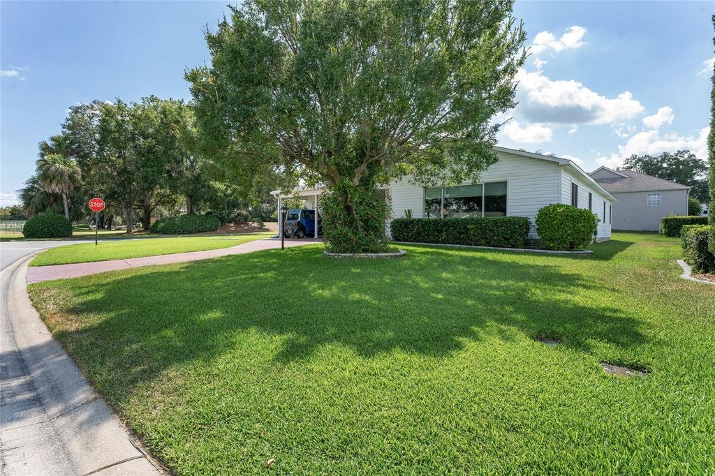 Photo of 1401 W Schwartz Boulevard, Lady Lake, FL 32159 (MLS # OM721974)