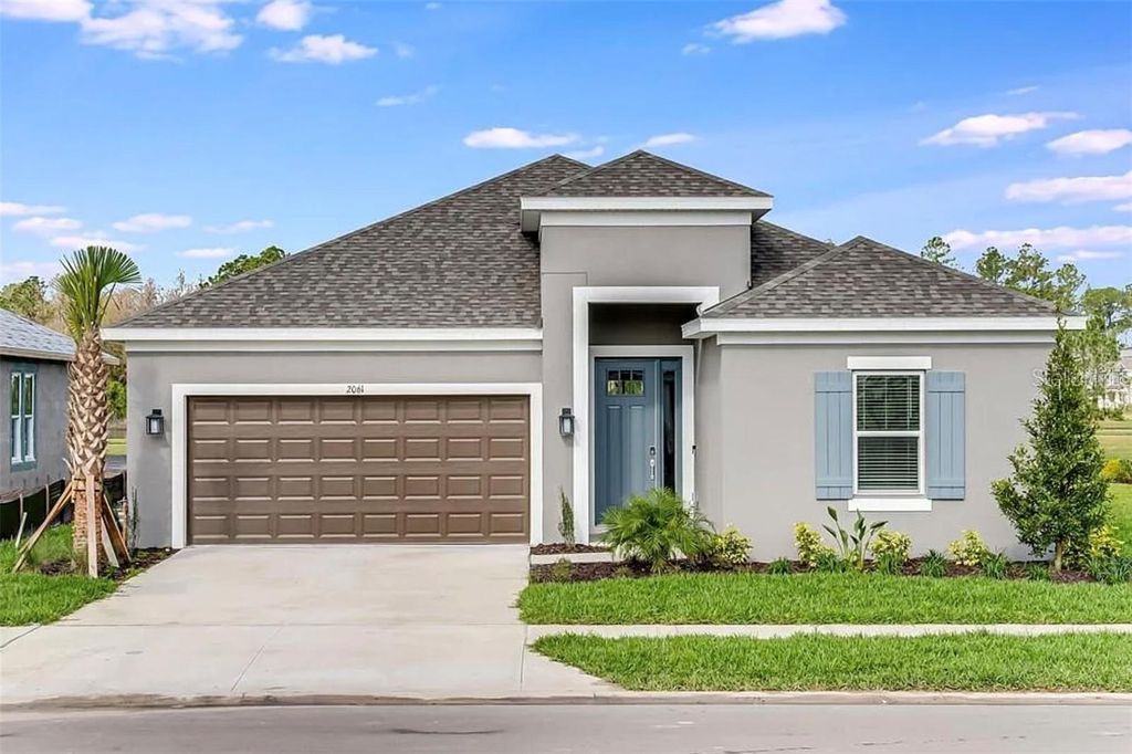 Photo of 1657 Longliner Loop, Wesley Chapel, FL 33543 (MLS # J993616)