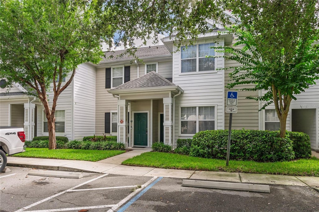 Photo of 1315 Eastern Pecan Place #202, Winter Garden, FL 34787 (MLS # O6437857)
