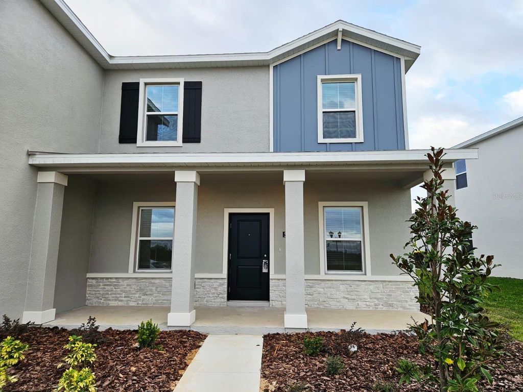 Photo of 5828 Meditation Dr, Clermont, FL 34714 (MLS # S5139084)