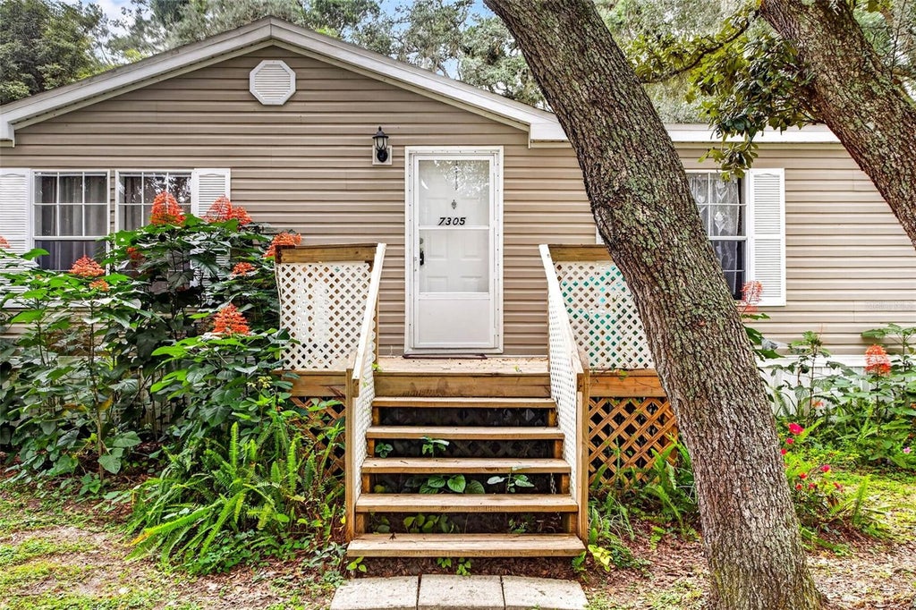 Photo of 7305 Timber Crest Lane, Zephyrhills, FL 33540 (MLS # TB8555503)