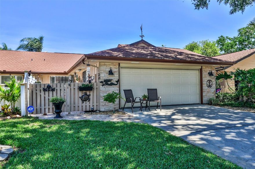 WATERFRONT LIVING - Beautifully UPDATED 2BR/2BA/2 Car Garage home with New Kitchen, Bathrooms, Flooring, 2017 Roof and Water Heater, A/C 2012. Kitchen has been opened up, making it part of the living space and perfect for entertaining. Open Floor Plan is enhanced by VAULTED CEILING in living area. New Waterproof planking in kitchen, dining and living area. Eat-in Kitchen features stainless steel appliances, new cabinets and countertops, with charming Bay Window overlooking entry courtyard with pavers, that provides a private outdoor space to relax in. Spacious family room overlooks spring-fed Lake Fairgreen with lots of light and great views. Enjoy water fowl, turtles and even the occasional otter from the comfort of your home, or from the waterfront paver patio. New skylights for plenty of natural light. Garage has wind rated and insulated door, as well as electric roll-up screen. Affordable annual H.O.A. dues provide termite bond, complete sprinkler system operation and maintenance, as well as irrigation water, and common area maintenance. Walk to 2 public golf courses, as well as community heated pool that is available by optional membership. Centrally located, and minutes from shopping, dining and entertainment, as well as historic downtown district, with the beach  and eclectic Flagler Avenue a short drive away. ;Water: City