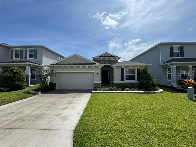 Spacious 4 bedroom, 2.5 bath home located in a gated community near SR 200, main roads, and schools. Home features tile flooring throughout with carpet in the bedrooms, inside laundry, and a fenced yard. Enjoy the nicely landscaped yard, a paved pad perfect for BBQs, and a screened porch for relaxing. Convenient location with community security and easy access to shopping and dining.
