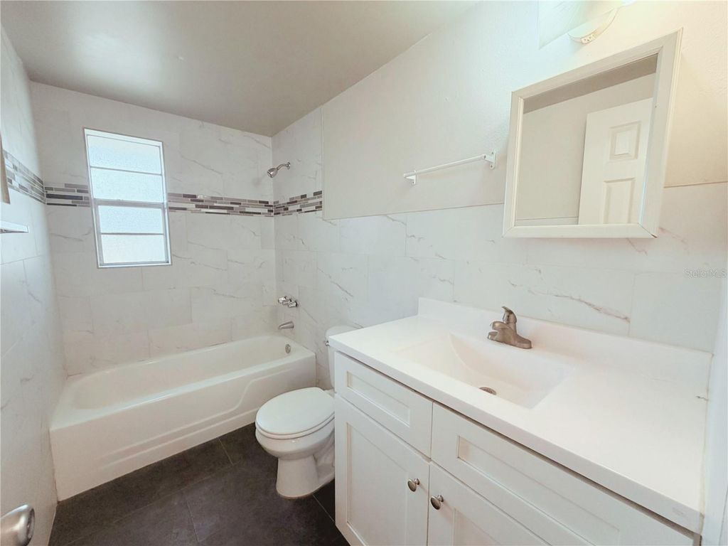 Photo of 5305 Oakwood Court #17, Tampa, FL 33610 (MLS # K4903457)