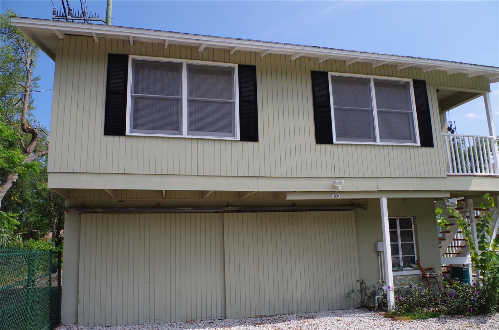 Spacious 2nd Story Garage Studio Apartment Feels Like you Live in the Tree Tops! Side Outside Staircase off Garden takes you to Covered Landing at Front Door. Light and Bright with Windows on All 4 Sides. Located in the Historic District of Sanford. Conveniently Located to Downtown Shops, Galleries, Breweries and Restaurants. Completely Updated - Refinished Wood Floors, Updated Kitchen and Bath, Kitchen Boasts Range, Refrigerator, Dishwasher and Microwave. Bathroom has Cabinet Sink and Shower. Studio Apartment Allows You to Define How You Choose to Live in the Space. Large Walk In Closet Gives Plenty of Storage. Washer and Dryer Located in Garage Below. Off Street Parking for One. Sorry, NO ANIMALS. Must See to Believe How Serene This Apartment Truly Is!