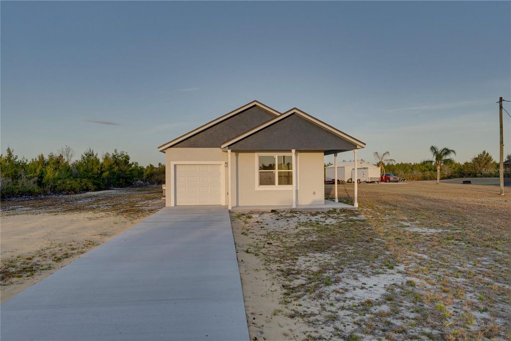 Photo of 7391 Orlando Drive, Lake Wales, FL 33855 (MLS # L4959117)