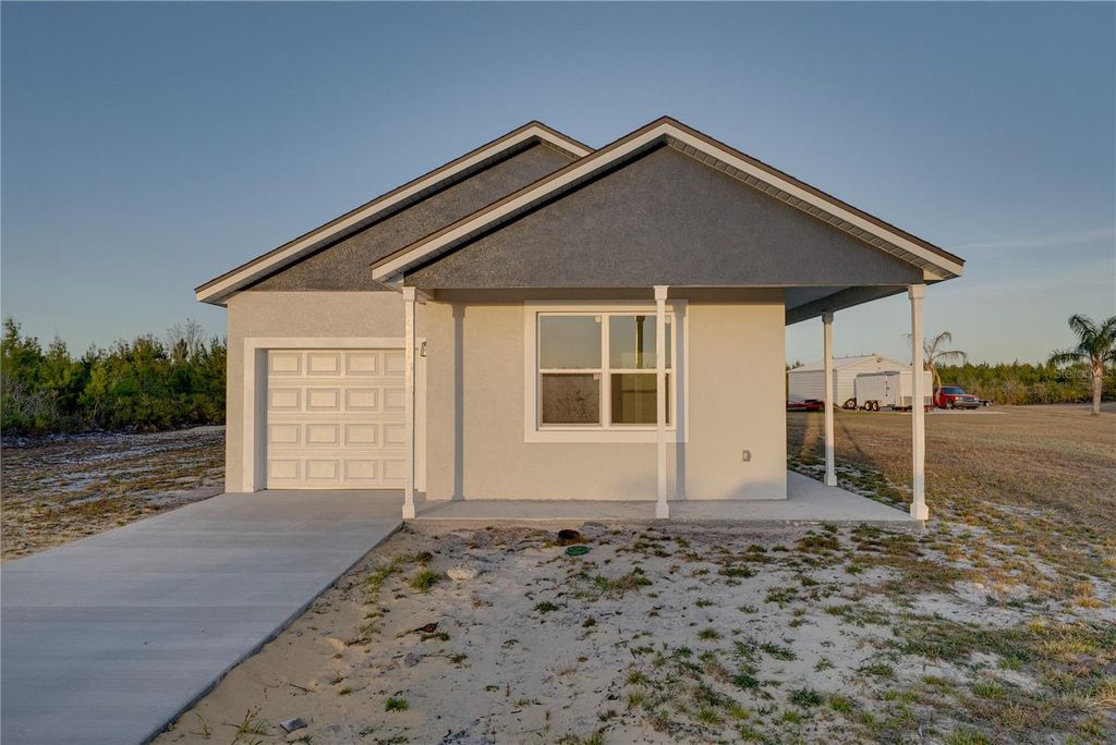 Photo of 7391 Orlando Drive, Lake Wales, FL 33855 (MLS # L4959117)