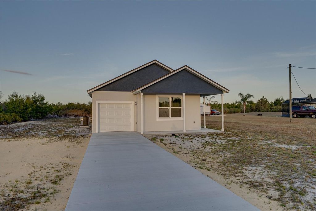 Photo of 7391 Orlando Drive, Lake Wales, FL 33855 (MLS # L4959117)