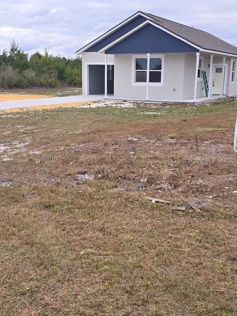 Photo of 7391 Orlando Drive, Lake Wales, FL 33855 (MLS # L4959117)