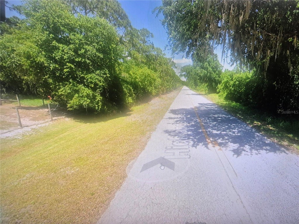 Photo of 749 Highlands Lake Drive, Lake Placid, FL 33852 (MLS # O6426348)