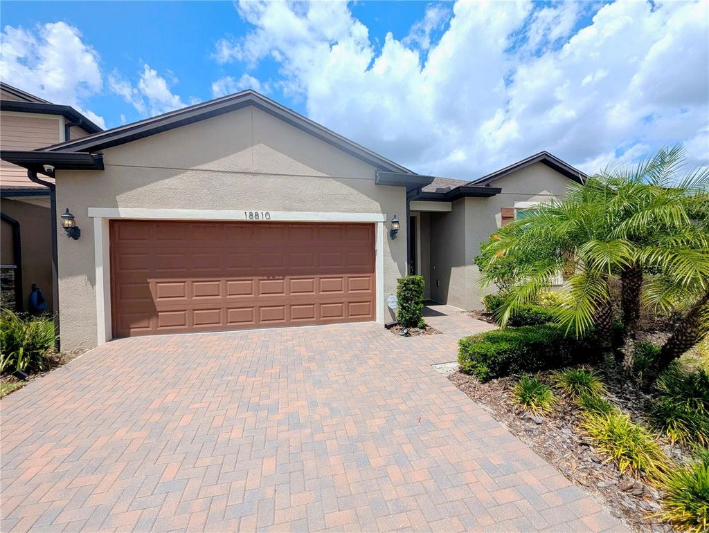 Photo of 18810 Birchwood Groves Drive, Lutz, FL 33558 (MLS # TB8502255)