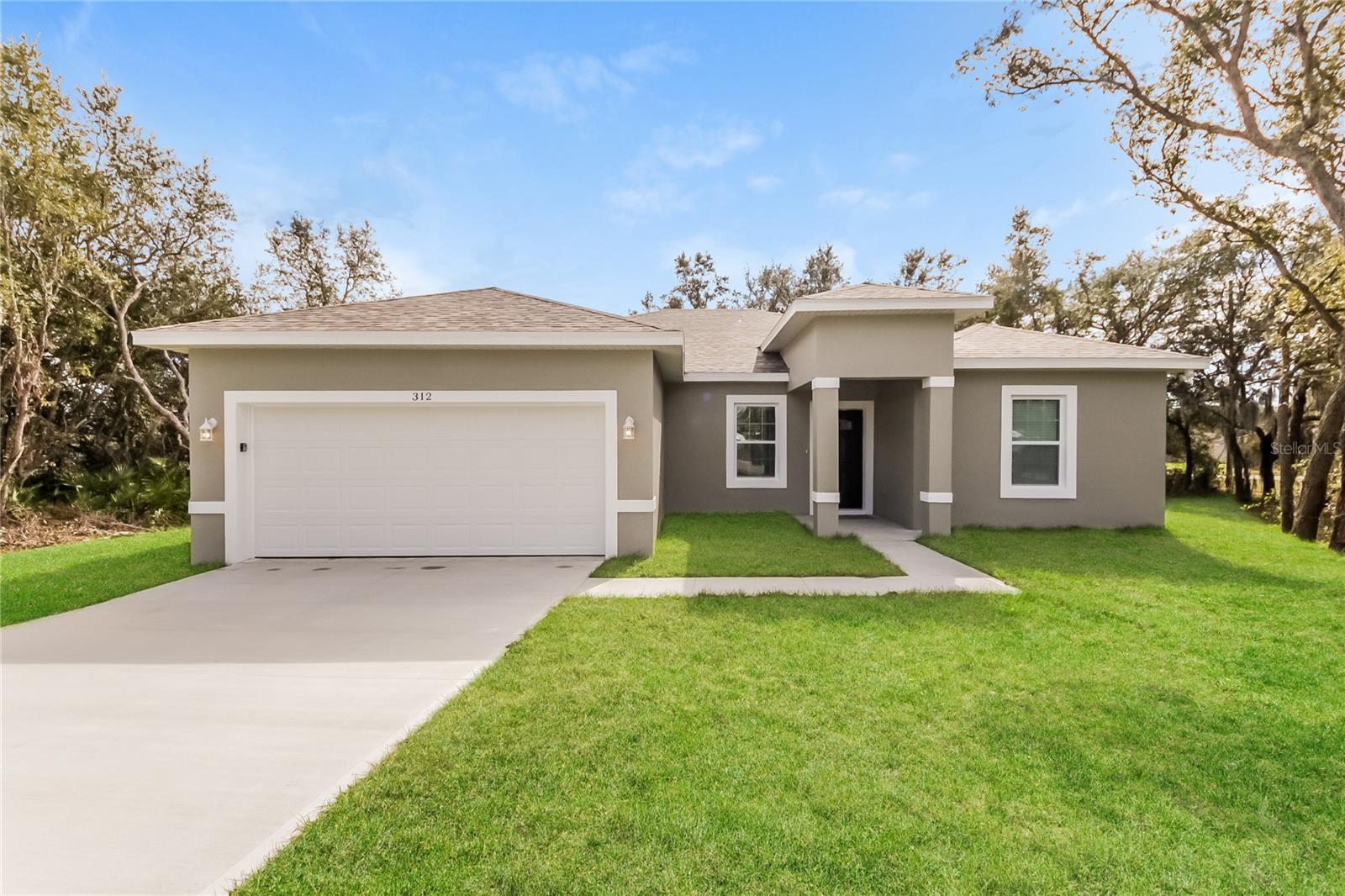 Spacious and well-maintained 4-bedroom, 3-bathroom home for rent in the Lake Marion Village area of Poinciana. Built in 2021, this home offers 1,891 sq ft of living space with a functional, open layout. The kitchen includes stainless steel appliances, ample cabinetry, and connects directly to the living and dining areas—ideal for everyday living and entertaining.
The primary suite is located at the rear of the home for added privacy and includes a walk-in closet and en-suite bathroom. Three additional bedrooms and two full baths provide flexibility for guests, office space, or household needs.
Additional features include tile flooring throughout, in-unit laundry, central heating and cooling, ceiling fans, window coverings, and an attached garage. Pets may be considered with approval.
Conveniently located near local parks, schools, shopping, and commuter routes to Orlando and surrounding areas. Available now.