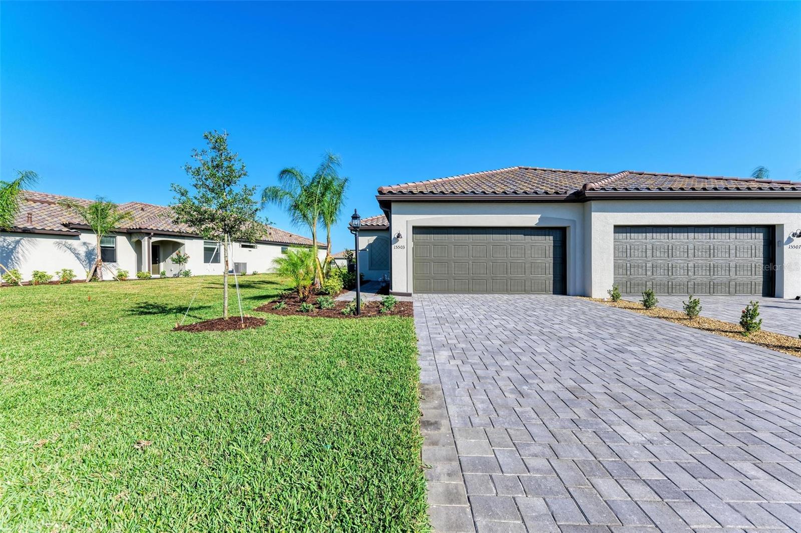 Move in ready with a whole house water system. Furnished for $2500 and move in ready! Exquisite Florida Resort Living in Lorraine Lakes. Discover refined, maintenance-free living in this brand-new, beautifully appointed 3-bedroom, 2-bath residence located in the sought-after community of Lorraine Lakes in Lakewood Ranch. Whether you're searching for a seasonal retreat or a full-time home, this property offers the ideal blend of comfort, elegance, and convenience. Designed with an open-concept layout, this sun-filled home features a spacious kitchen with all-new appliances, a two-car garage, and an enclosed lanai—perfect for enjoying your morning coffee or relaxing after a day in the Florida sun. World-Class Amenities at Your Fingertips - Residents of Lorraine Lakes enjoy access to an unparalleled suite of resort-style amenities, including: Resort-style pool with poolside dining and beverage service, Two fully equipped fitness centers, Indoor basketball court, Pickleball, tennis, bocce ball, and sand volleyball courts, Splash pad and heated, lap pool, Miniature golf, arcade, and coffee bar, Creative studios, community game nights, and social events, The vibrant clubhouse also, features a full-service bar and restaurant, offering the perfect setting to unwind, meet neighbors, and take in Florida’s stunning sunsets.
A Coveted Location. Situated within Lakewood Ranch, one of the nation’s top-rated master-planned communities, this property offers a lifestyle second to none. Flexible rental terms (minimum one-month stay, up to 12 leases per year) make it an excellent investment opportunity or second home.
Note: A minimum restaurant spend is required, easily met thanks to the exceptional culinary offerings on-site.