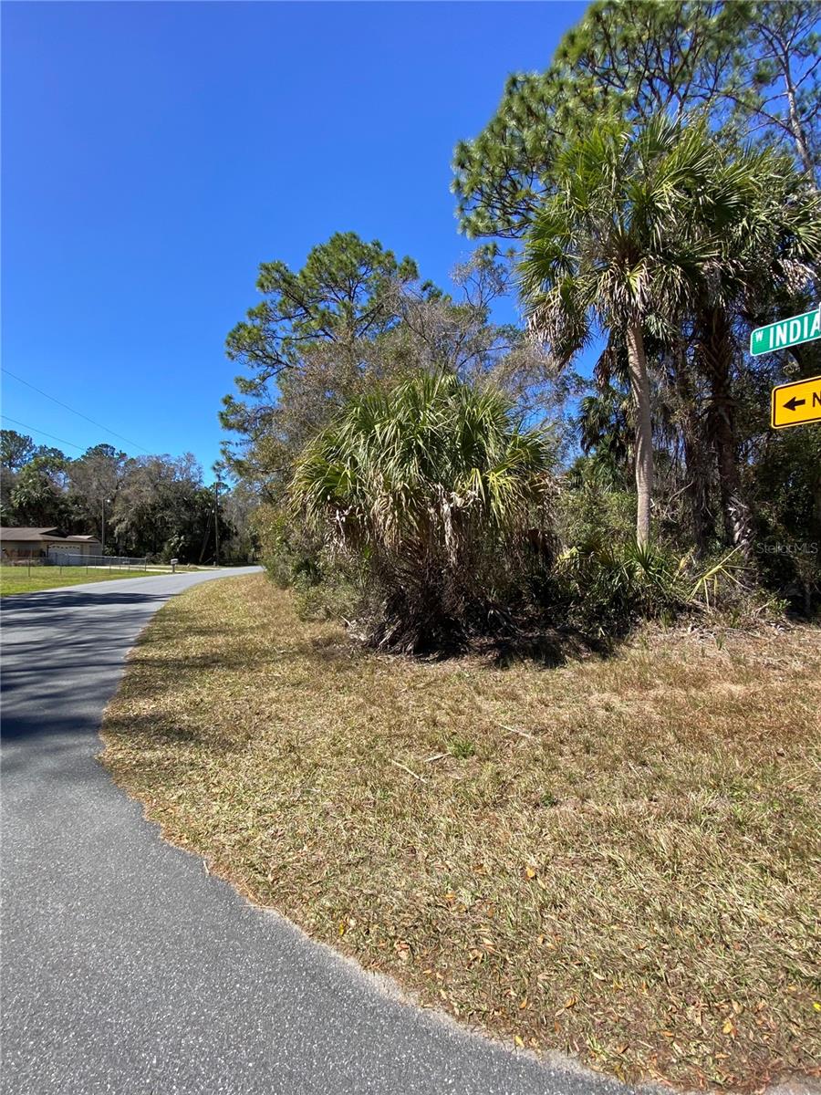 Discover your perfect slice of Florida living with this attractive corner lot in the peaceful Indian Woods Subdivision of Citrus County. Located on a well-maintained paved road just off US HWY 19, this ready-to-build property offers the ideal foundation for your dream home.
The location strikes a perfect balance between convenience and tranquility. Downtown Crystal River is just minutes away, while the neighborhood itself maintains a serene, countryside atmosphere. For water enthusiasts, nearby boat ramps provide direct access to the Gulf of Mexico, opening up endless possibilities for fishing, boating, and seasonal scalloping adventures.
Indian Woods residents enjoy easy access to Crystal River's many amenities, including local restaurants and shopping destinations, while being perfectly positioned to experience everything the Nature Coast has to offer. The subdivision's quiet, laid-back character creates an ideal setting for those seeking a peaceful residential environment.
This lot represents an excellent opportunity to build your custom home in one of Crystal River's most appealing areas. Whether you're looking to create a permanent residence or a vacation getaway, this property offers the perfect starting point in a community that exemplifies the best of Florida's natural charm and coastal lifestyle.
Make this corner lot your canvas and start planning your future home in this delightful Nature Coast community today.