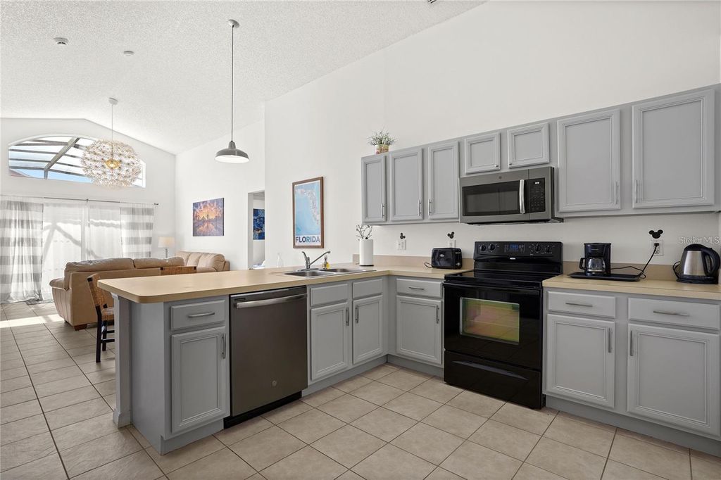 Photo of 155 Barefoot Beach Way, Kissimmee, FL 34746 (MLS # O6350455)