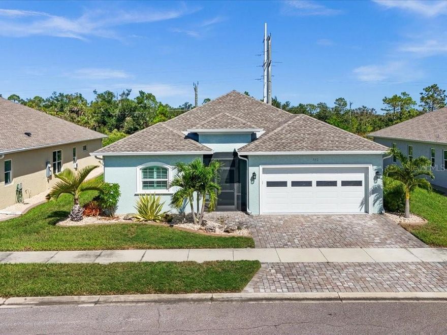 One or more photo(s) has been virtually staged. Popular Pearl floor plan home, located in one of Englewood’s most desirable communities, is packed with upgrades! Features include Luxury Vinyl Plank flooring and window treatments throughout, crown molding, impact windows and doors, and a screened entry. The open great room boasts tray ceilings and pocket sliders leading to the lanai. The upgraded kitchen offers Quartz countertops, a decorative backsplash, composite sink, pantry, and GE Café appliances.
The primary suite includes a tray ceiling, walk-in closet, office/den, lanai access, and an ensuite bath with a double vanity and oversized shower with abundant storage. Enjoy the outdoor kitchen, expanded screened lanai, tropical landscaping, and a 2-car garage with attic storage.
Community amenities include a clubhouse, pool, and tennis/pickleball courts. Ideally located near historic Dearborn Street’s shops and restaurants, this home is less than 15 minutes from the pristine beaches of Manasota Key and just a short drive to Boca Grande, Venice, and Nokomis beaches.