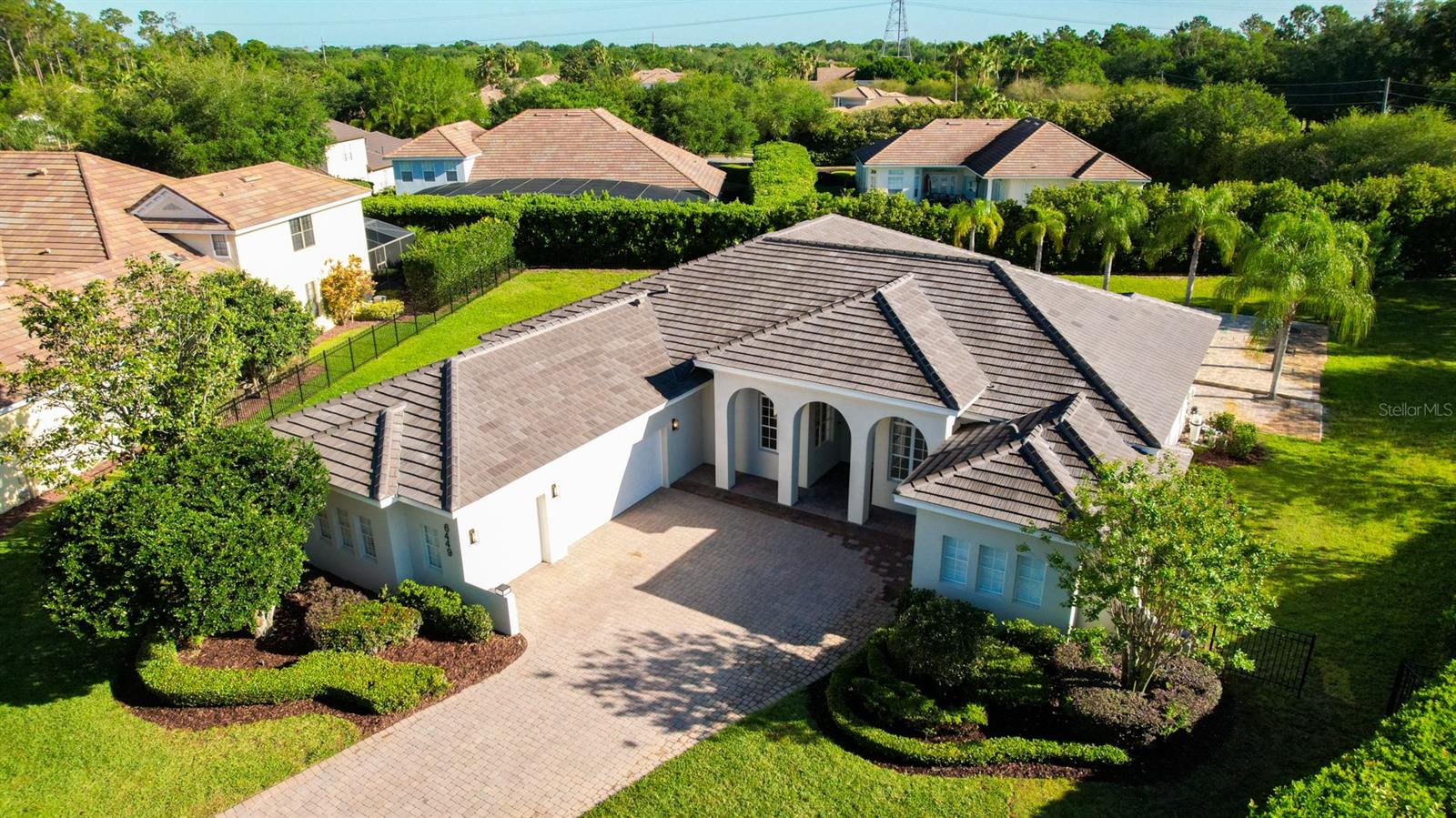 - This home has been completely transformed. The elegant European architectural style custom estate is perfectly sited on an oversized homesite in guard-gated Lake Butler Sound. Upon entering the house, the light from the windows and French doors visually links the formal areas. The updated gourmet kitchen offers a spacious setting for casual meals. The area offers convenience with exotic stone countertops, custom cabinetry, a pantry, porcelain tile flooring, and stainless appliances. The home office is very private. The romantic master suite is highlighted with a huge walk-in closet, a tub, large shower, and his and hers vanities. The secondary bedrooms are perfect for growing families. Sited on one of the largest lots in the neighborhood,
