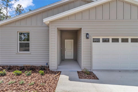 Photo of 7542 SW 128 Terrace Road, Dunnellon, FL 34432 (MLS # O6274943)