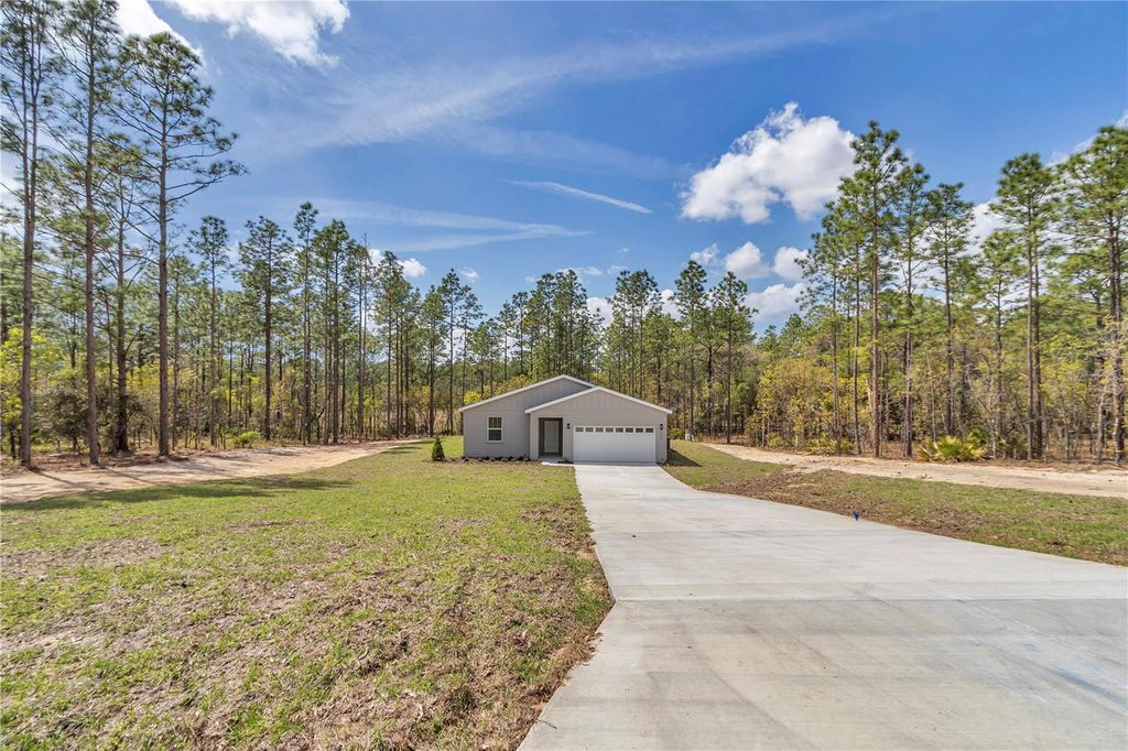 Photo of 7542 SW 128 Terrace Road, Dunnellon, FL 34432 (MLS # O6274943)