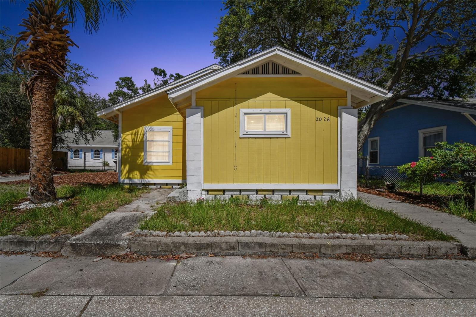 Just 6 minutes to Downtown St. Petersburg and 11 minutes to St. Pete Beach, this beautifully updated 2-bedroom, 1-bath home includes a bonus room that can function as a home office, den, or TV room. Located on a quiet residential street just 2 minutes from I-275, the neighborhood continues to grow in popularity, with many classic homes being renovated. This bright and cheerful home has been extensively updated by its long-term owner. The kitchen was remodeled in 2024 and features newer cabinetry, plenty of counter space, and stainless-steel appliances—including a brand-new GE French door refrigerator with bottom freezer (2024). The bathroom was also fully updated in 2024 with new tile flooring and walls, updated fixtures, shelving, and medicine cabinet. Recent major improvements include a new roof (2023), new central HVAC system (2023), and new R-38 attic insulation (2023) to enhance energy efficiency and lower utility bills. Additional features include all new plank tile flooring throughout, a spacious 23' x 12' living/dining room, four ceiling fans, and a newer hot water heater (2017). Extensive plumbing updates were completed in 2022. The home also offers a 20-ft front porch, a large side yard for parking or outdoor space, and a detached metal storage/tool shed. Inside laundry area included. Owner will accept Section 8 vouchers.