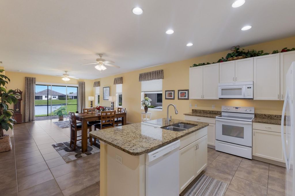 Photo of 7616 Alumni Trail, Sarasota, FL 34243 (MLS # A4657736)