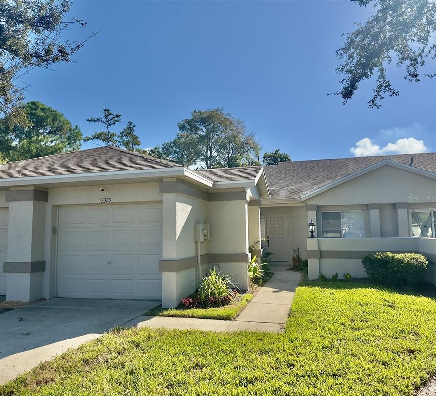 Welcome Home in the desirable Meadow Woods!  Conveniently situated just minutes from SR-417, the Florida Turnpike, Orlando International Airport and less than five minutes from Publix, and a variety of  shopping and dining options, this property provides exceptional accessibility. Enjoy quick commutes to Florida Mall, Downtown Orlando, See World and  Universal Studios in approximately 20 minutes. This Townhouse  has two bedroom and two bathroom  offers the perfect combination of comfort, functionality, and a prime location. The Townhome features a spacious open-concept floor plan with vaulted ceilings in both the great room and kitchen, creating a bright and airy living space. A skylight in the kitchen enhances natural light, while sliding glass doors open to the patio and backyard, perfect for relaxing or entertaining.  Interior highlights include all-tile flooring   and a split-bedroom layout for added privacy. The eat-in kitchen offers a pantry closet, laundry area, and a pass-through to the great room. The primary suite features a walk-in closet and private bath.  Additional features include a one-car garage with an automatic opener and ample guest parking. Recent updates include a new water heater -2023-, the roof and AC system was replaced in 2020 .  The HOA covers exterior maintenance, landscaping, irrigation,  providing low-maintenance living. This home is priced to sell “As-Is”.