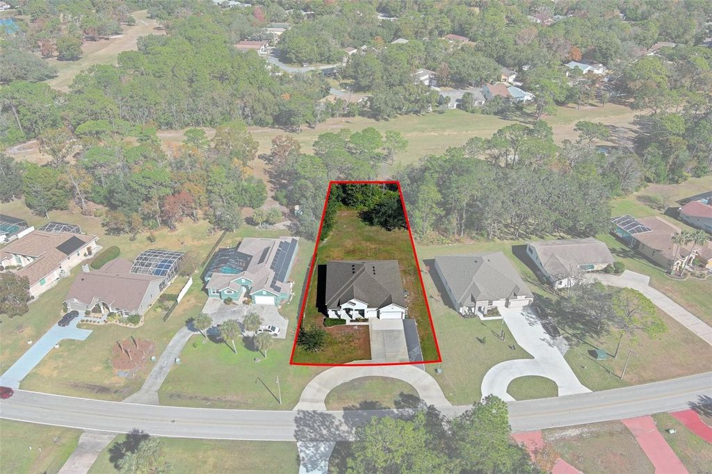 Photo of 64 Cypress Boulevard, Homosassa, FL 34446 (MLS # W7879659)