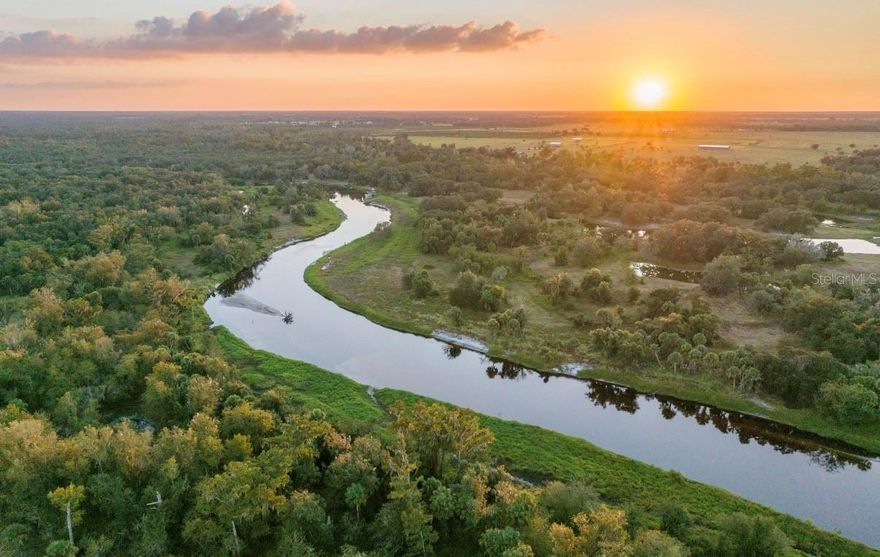 310± acres with approximately 1.25 miles (over one mile) of Peace River frontage, this offering provides a rare chance to acquire a significant Florida property. Private, expansive, and naturally beautiful, the property delivers a sense of space and exclusivity that is becoming increasingly uncommon and rare to find in Florida today.

Property is pending a conservation easement. A recent survey completed less than one year ago confirms the acreage. The conservation easement allows for the construction of one single-family residence up to 5,000 square feet and two barns not to exceed 2,500 square feet each.

The property offers exceptional recreational use with abundant wildlife, including whitetail deer, Osceola turkeys, axis deer, and wild hogs, providing outstanding hunting opportunities. Significant improvements are currently underway, including new ponds being dug, underbrushing and clearing, pasture improvements, and new fencing.

An additional adjoining 700± acres bordering the south side of the property may be available for purchase. This adjoining tract is conserved and allows for two additional single-family residences up to 5,000 square feet each, four barns, and up to 10,000 square feet of agricultural buildings, with approximately seven miles of Peace River frontage and three miles of Joshua Creek.

Schedule your private showing today.
