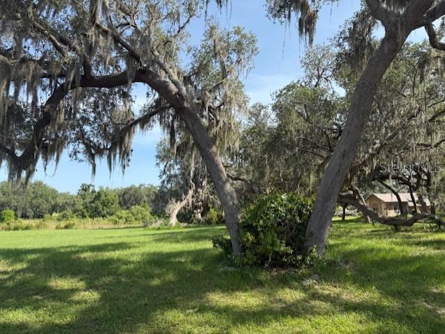 Beautiful Corner Lot - Prime property in a Quality Inverness Neighborhood! If you are looking for a peaceful setting to build your forever dream home, look no further! This spacious corner lot in Baymeadows offers the perfect opportunity in a well-established single family neighborhood. This community is surrounded by beautiful homes, mature trees, and an ideal setting for the construction of your new home. This property is located only 3.5 miles from downtown Inverness, and the popular Withlacoochee Bike Trail. This community allows for the perfect balance of quiet residential living with convenient access to shopping centers, restaurants, medical and schools. You will love your view of the pond in your own back yard and can relax and unwind with this gorgeous setting. This lot is a must see - beautiful area and beautiful setting!