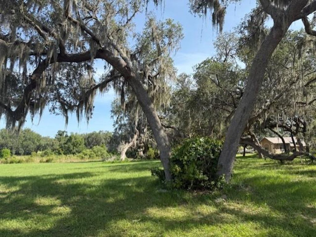 Photo of 2550 S Bali Point, Inverness, FL 34450 (MLS # OM703521)