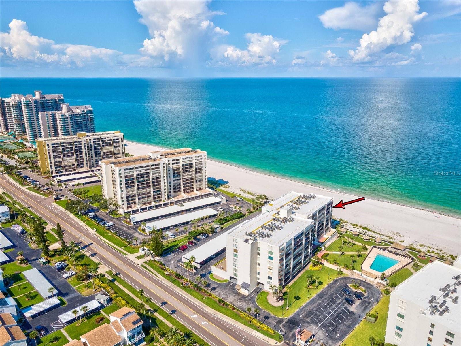 Breathtaking views await at this stunning waterfront condo! Perched on the 7th floor NW CORNER, it offers a front-row seat to the Gulf of Mexico, Sand Key, and the Intracoastal Waterway from every room. Truly unique-This stunning FURNISHED 2-bedroom, 2-bathroom corner condo is a true gem, offering breathtaking views from every room. Imagine starting your day with a sunrise over the ocean and ending it with a sunset over the water - it's the perfect blend of tranquility and excitement! This beautifully updated condo has been thoroughly renovated in recent years, featuring a sleek and modern kitchen with granite countertops, stainless steel appliances, a wine refrigerator, and an eat in area, breakfast bar- perfect for entertaining. The bathrooms have also been updated with style and functionality, while the living room, kitchen, and bathrooms boast beautiful tile flooring. The bedrooms feature newer water-resistant plank laminate flooring, ensuring a comfortable and practical living space. But that's not all - this condo has been upgraded with crown molding, raised ceiling in the kitchen, custom closets, electric hurricane shutters for windows and the balcony, and newer impact sliding doors, balcony door, and windows, a tankless electric water heater for endless hot water. But what really sets this condo apart is its incredible amenities! You'll love having two covered parking spaces- one under building and one in the carport plus a spacious corner unit storage space to stash all your beach gear and toys. Plus, the community offers a fantastic array of perks, including a massive, Olympic-sized pool for swimmers, fitness center and a cozy clubhouse to socialize with friends and neighbors. As a corner unit, this condo offers an abundance of natural light and stunning views from every angle. The expansive balcony is the perfect spot to take in the sights and sounds of the beach, and the location is unbeatable - just steps from the beach, restaurants, and all the amenities Clearwater Beach has to offer. Don't miss out on this rare opportunity to own a piece of paradise! Contact me today to schedule a viewing and make this incredible condo your dream home.