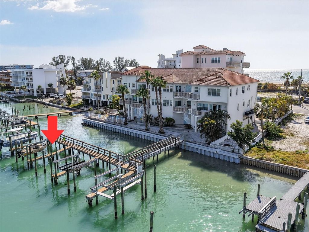 Photo of 10133 Gulf Boulevard #E1, Treasure Island, FL 33706 (MLS # TB8455363)