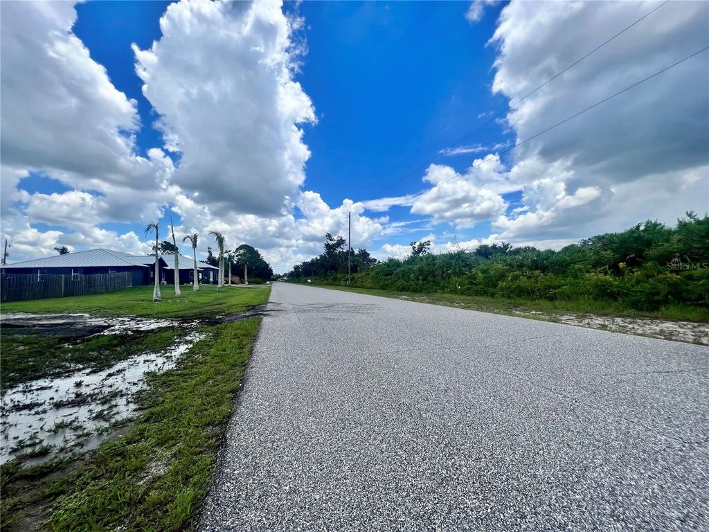 Photo of 12146 Richards Avenue, Port Charlotte, FL 33981 (MLS # C7508349)