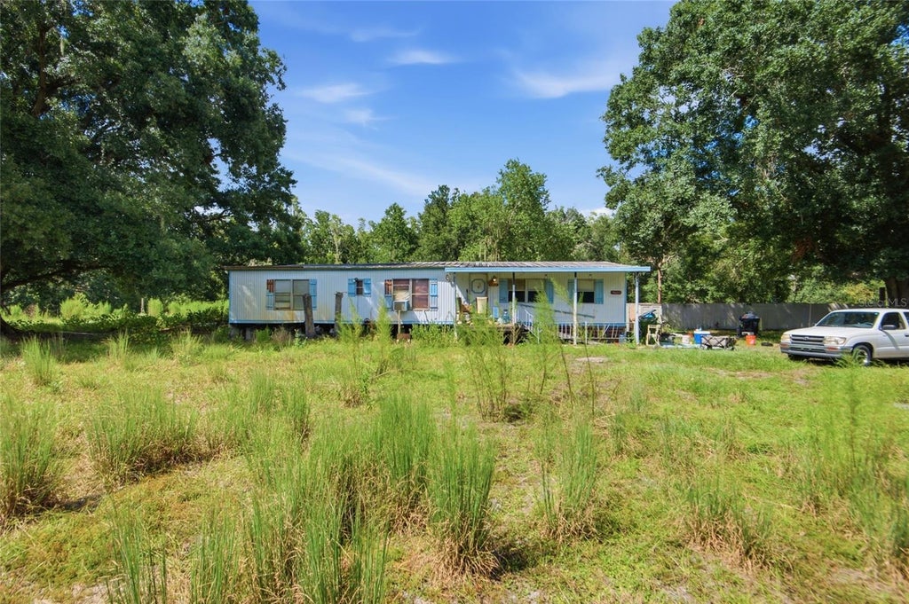 Photo of 9654 Old Evergreen Trail, Lakeland, FL 33809 (MLS # TB8543562)