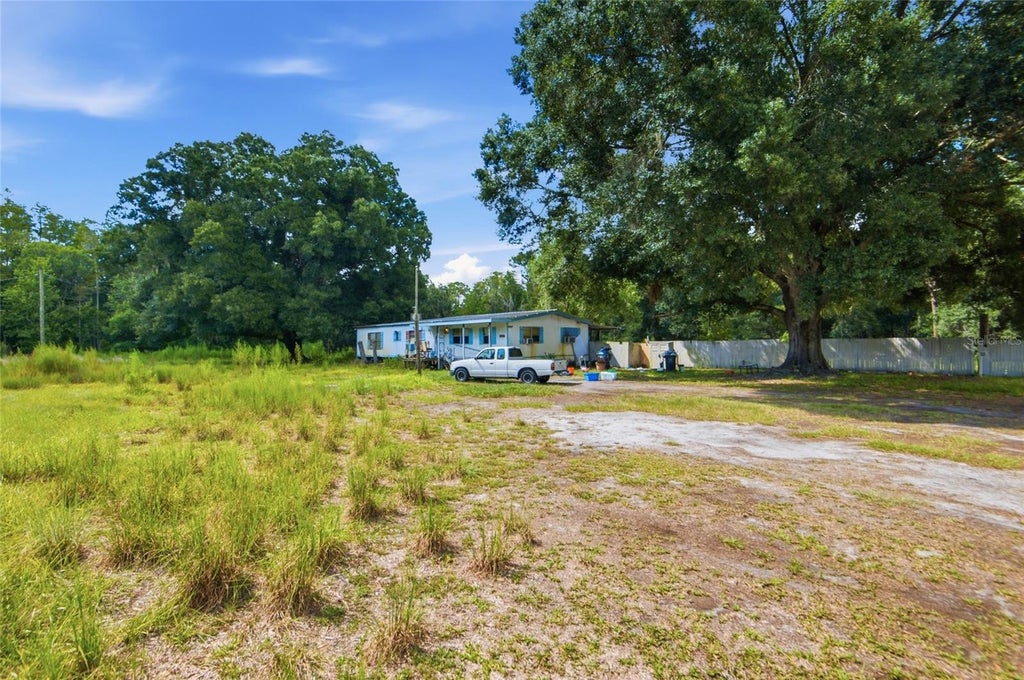 Photo of 9654 Old Evergreen Trail, Lakeland, FL 33809 (MLS # TB8543562)