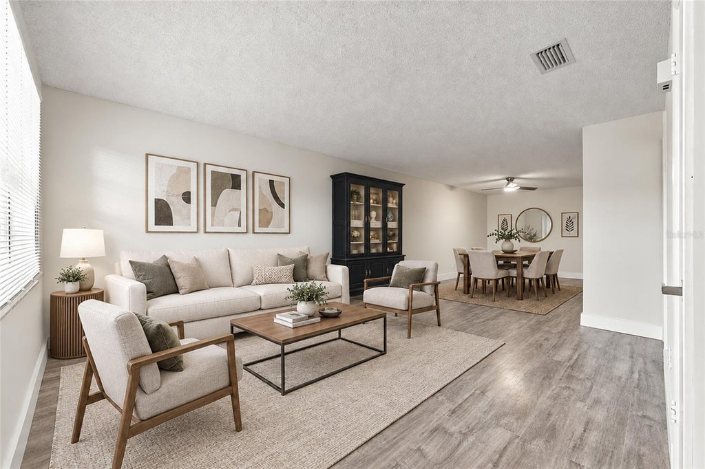 Photo of 5765 Saint Christopher Drive #56, Orlando, FL 32822 (MLS # O6453570)