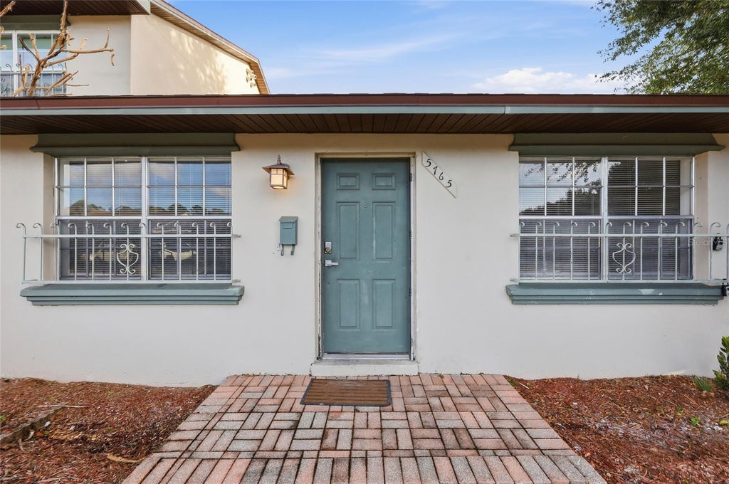 Photo of 5765 Saint Christopher Drive #56, Orlando, FL 32822 (MLS # O6453570)
