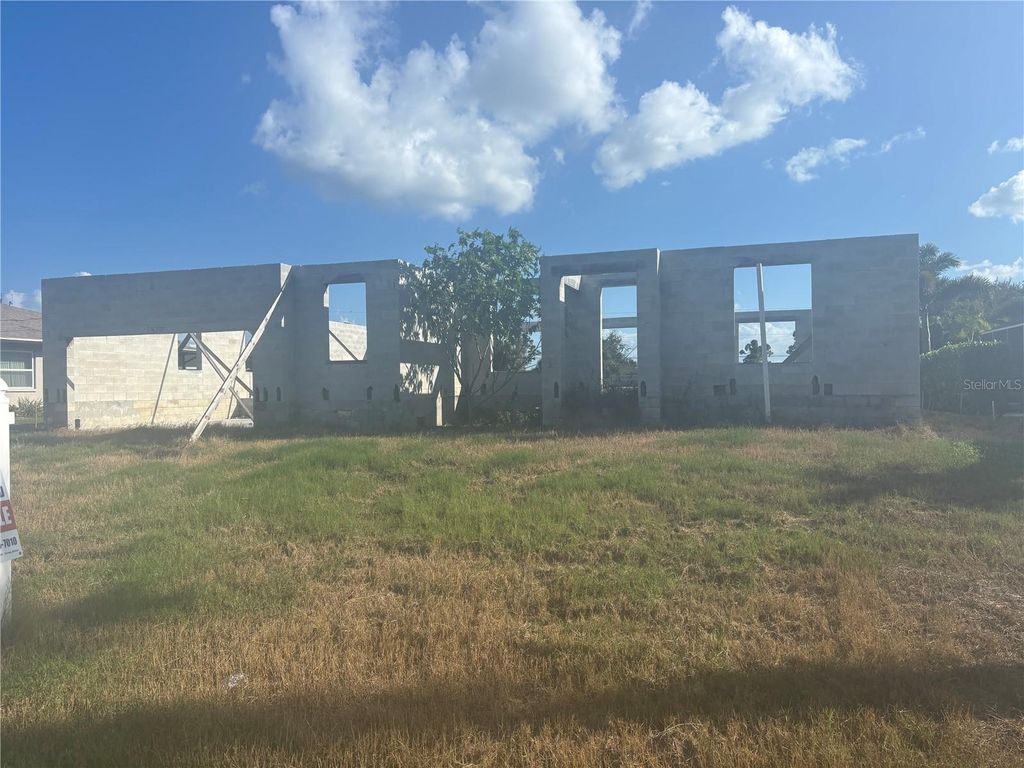 Photo of 41 Mark Twain Lane, Rotonda West, FL 33947 (MLS # TB8443582)