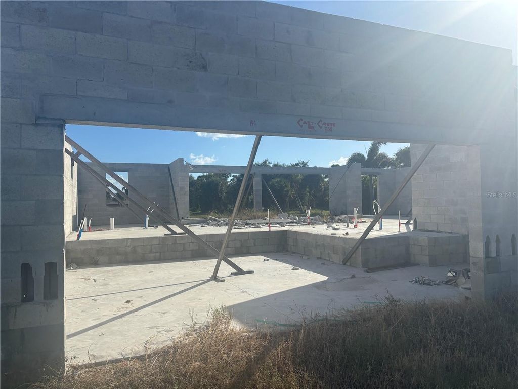 Photo of 41 Mark Twain Lane, Rotonda West, FL 33947 (MLS # TB8443582)