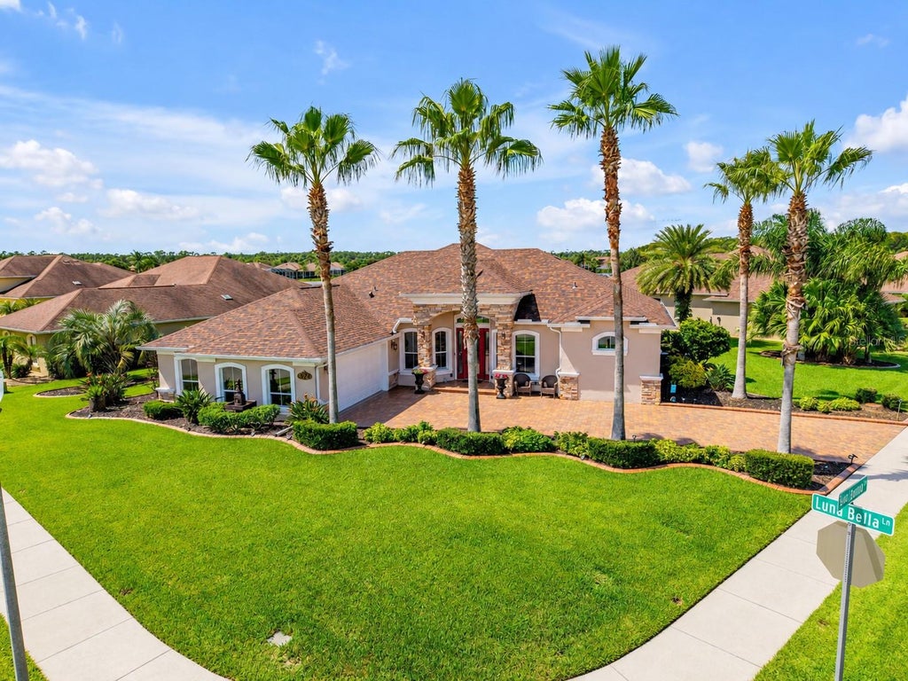 Photo of 574 Luna Bella Lane, New Smyrna Beach, FL 32168 (MLS # NS1089234)