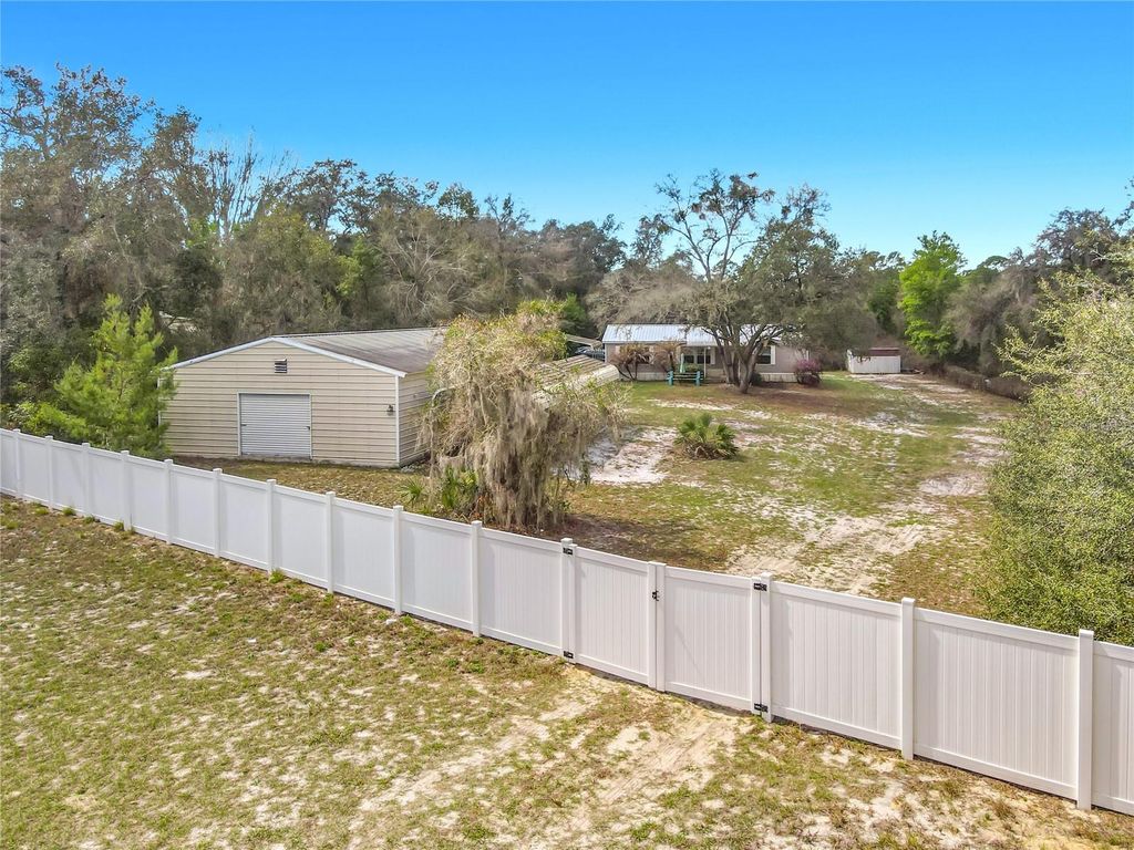 Photo of 42316 Pond View Lane, Deland, FL 32720 (MLS # O6388683)