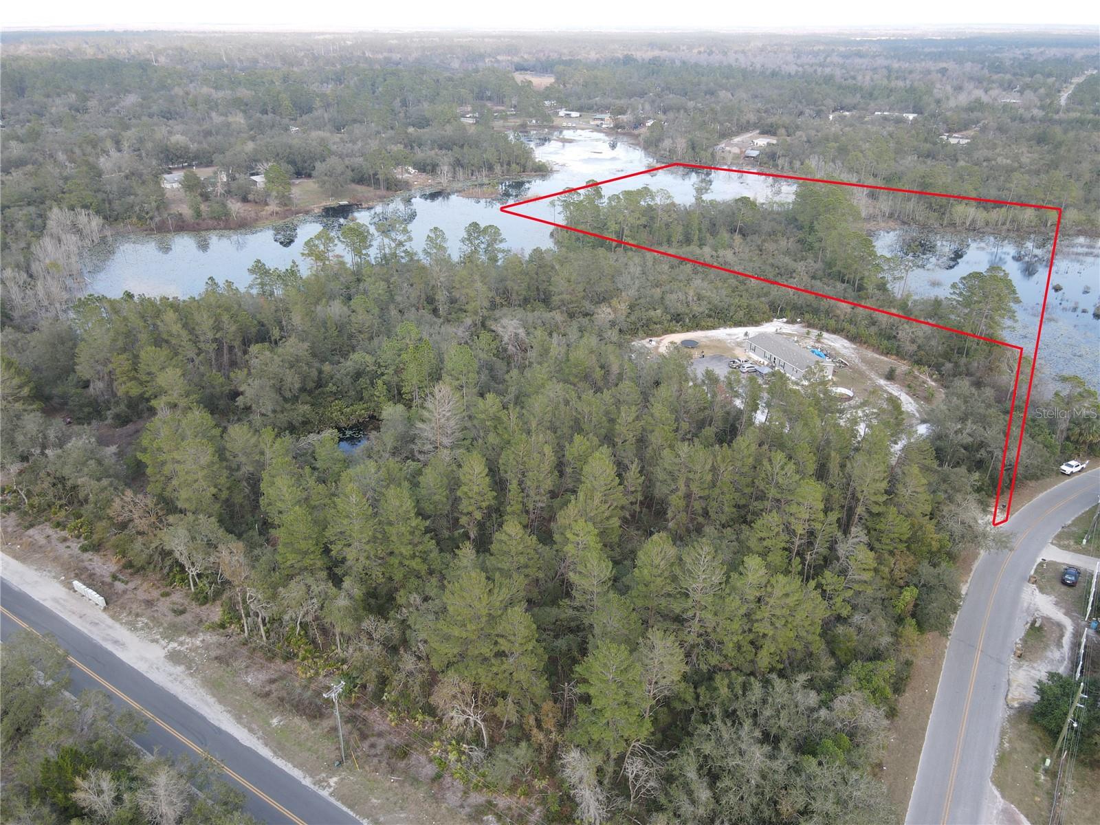 This almost perfectly square 10-acre parcel with legal access near the paved Bear Lake Road on Deland’s west side is the perfect country retreat. Waterfront living awaits! Conveniently located between Historic Downtown Deland and Mount Dora and under a 50-minute ride to Daytona Beach and Orlando, this haven in the country is right in the middle of it all.